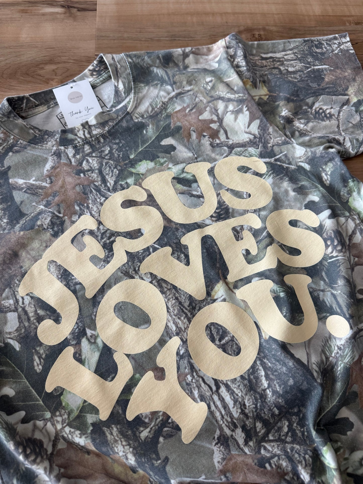 Jesus loves you tee