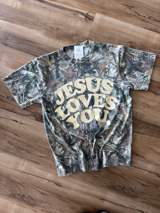 Jesus loves you tee